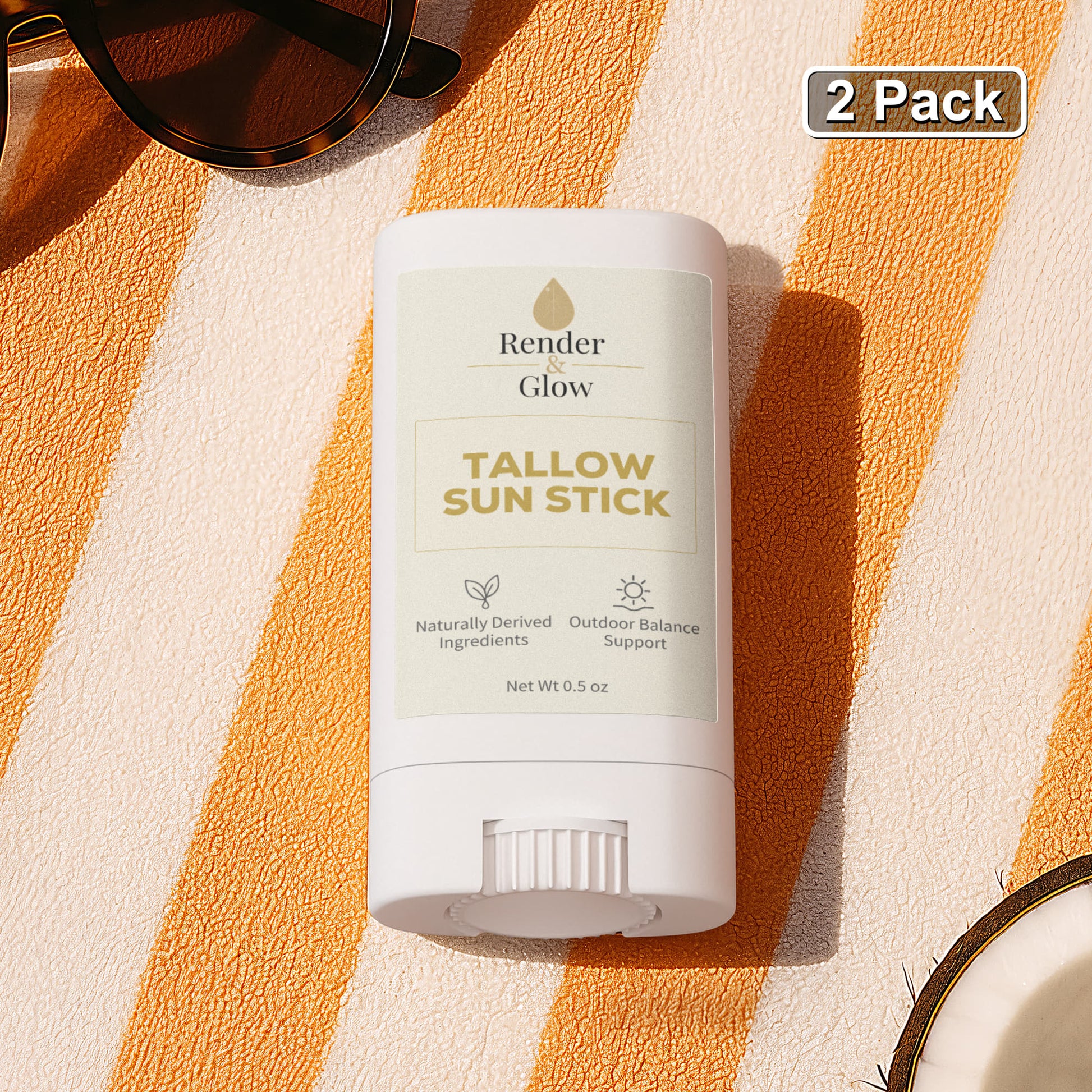 Render & Glow Tallow Sun Stick (2-Pack) sits on an orange-white surface with sunglasses and a "2-Pack" label above.
