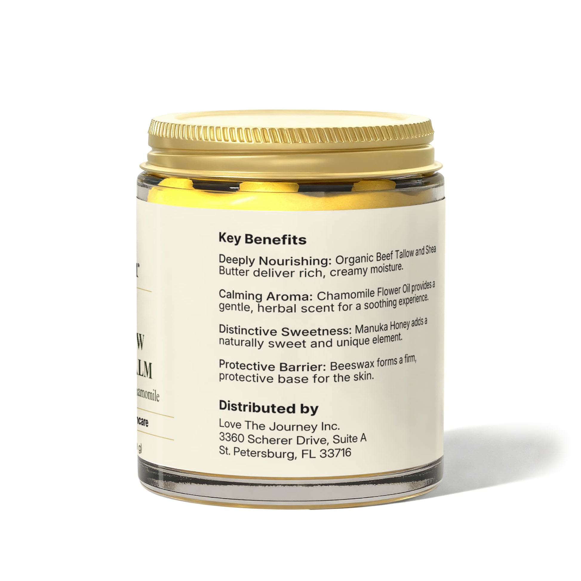 A glass jar with a gold lid labeled Render & Glow Tallow Body Balm for intense daily hydration.