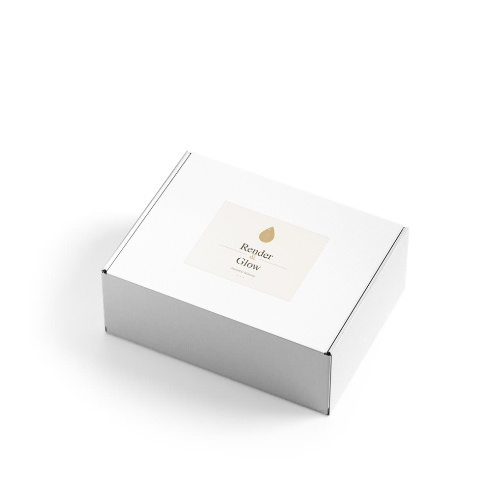 A white rectangular box labeled "Render & Glow" with a gold droplet, featuring Whipped Tallow Skin Balm inside.